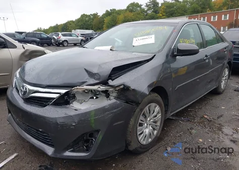 2014 Toyota Camry Le z USA, uszkodzony, nr VIN 4T1BF1FK5EU394015